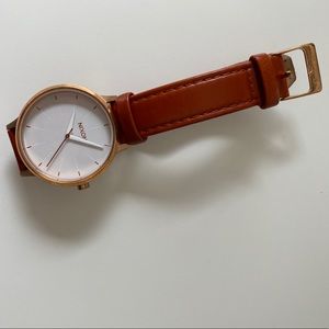 Nixon gold and leather watch